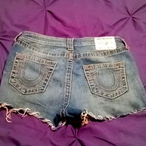 Distressed denim shorts